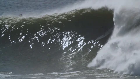 HUGE WAVE SURFING Stock Footage 128942029