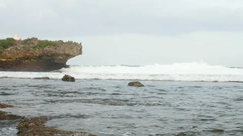 Huge waves break on the rock Stock Footage 165843889