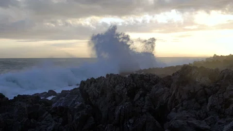 Huge waves break on the stones Stock Footage 102754903