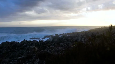Huge waves break on the stones, slow motion Stock Footage 102849558