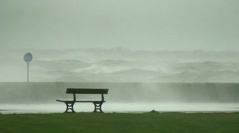 Huge waves breaking over sea wall 1 Stock Footage 672541