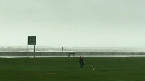 Huge waves breaking over sea wall 3 Stock Footage 672561