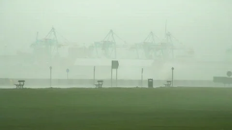 Huge waves breaking over sea wall 7 Stock Footage 673558