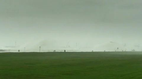 Huge waves breaking over sea wall 8 Stock Footage 682147