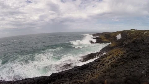 Huge waves crushing against Blackpoint in D'entrecasteaux NP Stock Footage 70904940