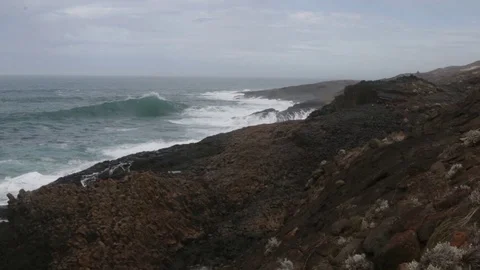Huge waves crushing against Blackpoint in D'entrecasteaux NP Stock Footage 72183753