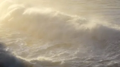 Huge waves hitting the cliff and exploding Stock Footage 148173620