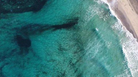 Huge Waves over turquoise waters with INSPIRE 2 drone Stock Footage 101428930