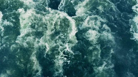 Huge waves stream of deep blue water with foam rising Stock Footage 65565378