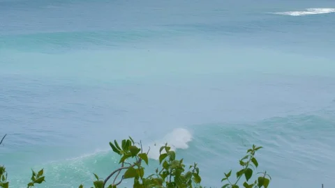 Huge waves with white foam and splashes in tropical ocean Stock Footage 114560440