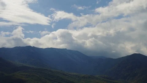 Huge white clouds in blue sky, time lapse Stock Footage 81088256