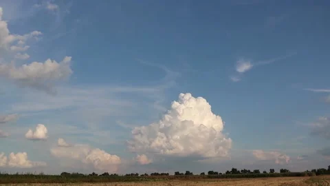 Huge white clouds rural timelapse at sunset Stock Footage 169180707