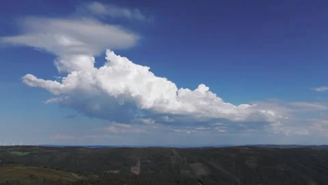 Huge White Fluffy Clouds Floating Over Rural Nature. Wide Shot Stock Footage 276283827