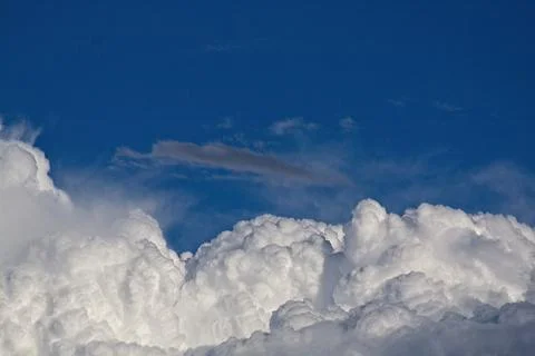 Huge white storm cloud forming. Stock Photos