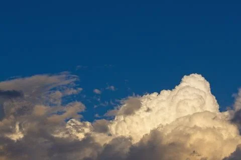 Huge white storm cloud forming. Stock Photos