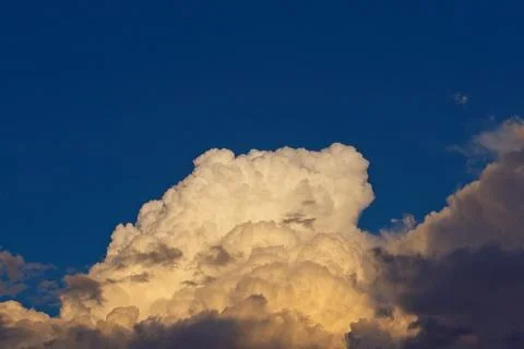 Huge white storm cloud forming. Stock Photos