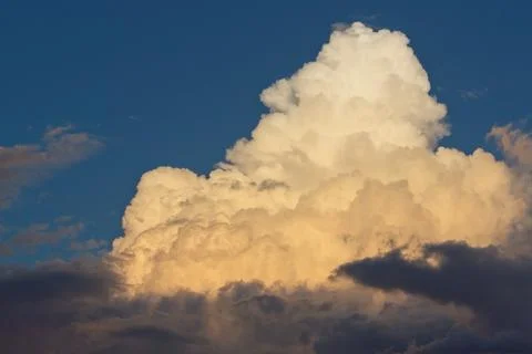 Huge white storm cloud forming. Stock Photos
