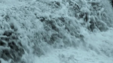 Huge white waterfall close to Stock Footage 99860352