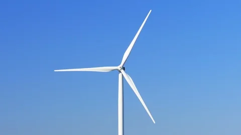 Huge wind generator on blue sky background Stock Footage 116051297