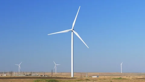 Huge wind generators against blue sky Video stock 116050863