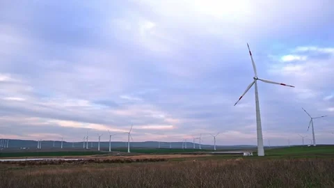 Huge windmill generator turbines. Alternative energy. Stock-Footage 186242743