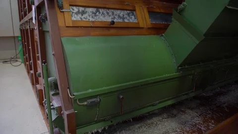 Huge wooden sorting machine from feather to down, selective focus Stock-Footage 71610430