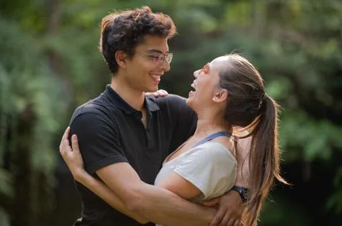 Hugging young couple Stock Photos