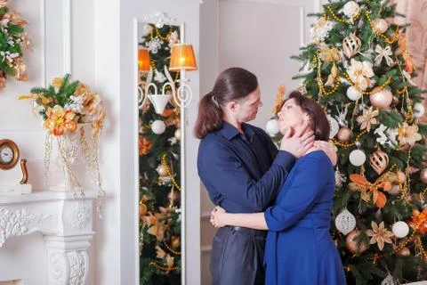 Hugs pregnant couple Stock Photos