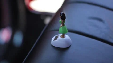 Hula Dancer Dashboard Decoration Stock Footage 25239748