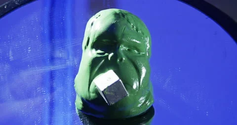 Hulk magnetic putty face melts with different clips Stock Footage 221876205