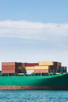 Hull of a big ship loaded with containers Stock Photos