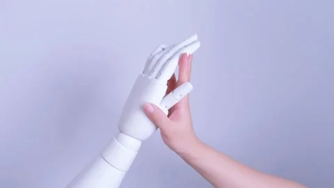 Human and robot hands touching Stock Footage 317211652