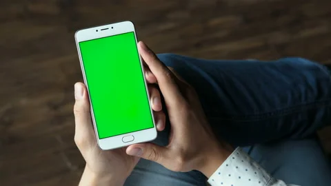 Human arms hold electronics gadget with chromakey touchpad closeup. Guy gesturin Stock Footage 199492684