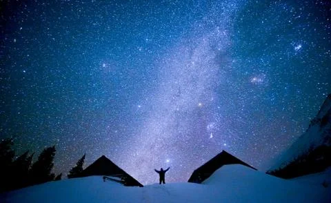 Human on the background of the starry sky Stock Photos