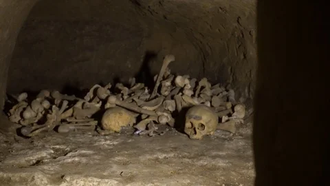 Human bones and skull in a tomb. Stock Footage 124906046