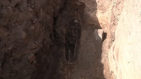 Human bones in archaeological excavations Stock Footage 93712383
