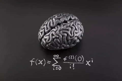 Human brain model with difficult formula math drawn with chalk on blackboard Stock Photos