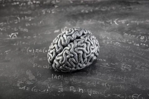 Human brain model with mathematical equations on old worn school chalkboard Stock Photos