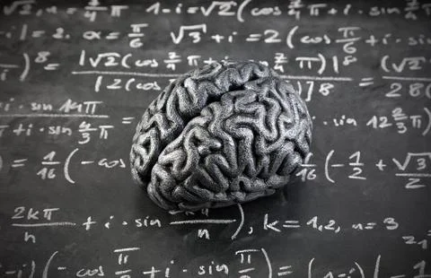 Human brain model with mathematical equations on scholl chalkboard Stock Photos