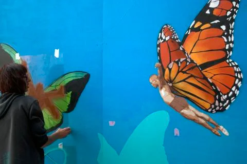 Human butterfly graffiti. Stock Photos