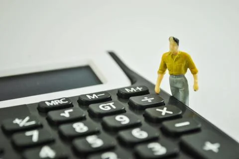 Human with calculator device Stock Photos