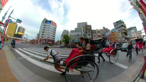 The human carriage on the side of the road in Osaka Japan Stock Footage 129279337