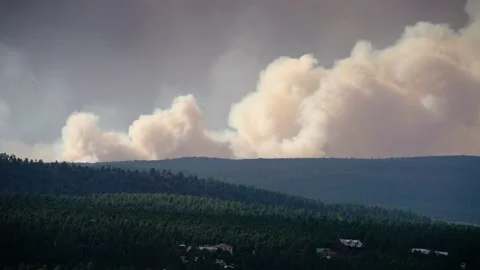 Human caused fire burning out of control in northern New Mexico Stock Footage 231254433