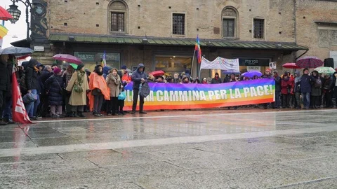 Human chain around Piazza Maggiore and "Bologna walks for peace" sign  Stock Footage 102268420