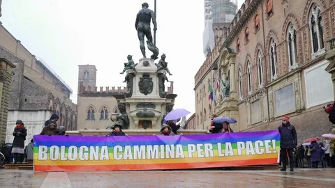 Human chain around Piazza Maggiore and "Bologna walks for peace" sign  Stock Footage 102268480