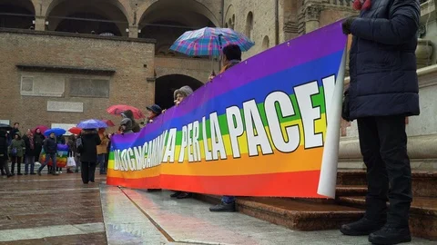 Human chain around Piazza Maggiore and "Bologna walks for peace" sign  Stock Footage 102268706