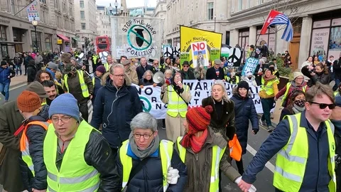 Human chain leading march to support ukraine chant no nuclear war audio Stock Footage 171484187