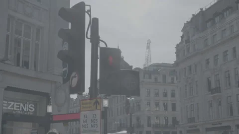 Human crossing traffic light turns green in London Stock Footage 219271533