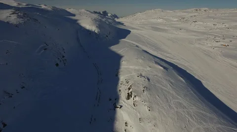 Human crowd following each other: skiers racing the the Greenland snow Stock Footage 65147850
