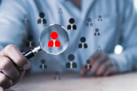 Human development and Recruitment concept , Business man using magnifier glas Stock Photos